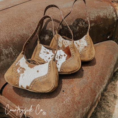 Rodeo Royalty Cowhide Purse by Countryside Co.